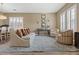 Bright living room features a large window, wood-look flooring, and neutral decor at 8929 Monte Oro Dr, Las Vegas, NV 89131