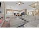 The spacious, open-concept living room and kitchen provide ample space for relaxing and entertaining, great natural light at 8929 Monte Oro Dr, Las Vegas, NV 89131