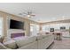 Open-concept living area with a fireplace, spacious kitchen, and dining area, perfect for entertaining and Gathering gatherings at 8929 Monte Oro Dr, Las Vegas, NV 89131