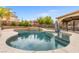 Beautiful swimming pool with steps, in-ground spa and protective safety fence at 8929 Monte Oro Dr, Las Vegas, NV 89131
