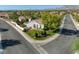 Aerial view of a charming single-story home with a well-maintained front yard and mature trees at 9201 Yucca Blossom Dr, Las Vegas, NV 89134