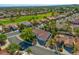 Beautiful aerial view of the neighborhood with well-maintained homes near the golf course, lush trees and serene atmosphere at 9201 Yucca Blossom Dr, Las Vegas, NV 89134
