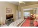 Comfortable bedroom with mirrored closet and ceiling fan at 9201 Yucca Blossom Dr, Las Vegas, NV 89134