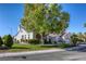 Charming single-story home with manicured lawn, mature shade trees, and a two-car garage at 9201 Yucca Blossom Dr, Las Vegas, NV 89134
