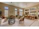 Spacious living room with an open floor plan and a view into the adjacent dining area at 9201 Yucca Blossom Dr, Las Vegas, NV 89134