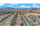 High-angle view of a well-planned community featuring neatly arranged houses and landscaping at 9947 Tucket Point Ct, Las Vegas, NV 89178