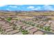 Expansive aerial shot of a residential community with mountain views in the background at 9947 Tucket Point Ct, Las Vegas, NV 89178
