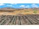 Wide aerial panorama of a housing community in a desert environment with mountain backdrop at 9947 Tucket Point Ct, Las Vegas, NV 89178