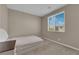 Cozy bedroom with carpet, one window, and space for a bed at 9947 Tucket Point Ct, Las Vegas, NV 89178