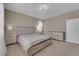 Bright bedroom features neutral decor, carpeted floor, dresser, night stands and large window at 9947 Tucket Point Ct, Las Vegas, NV 89178