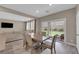 Dining area with view of the backyard and modern furniture at 9947 Tucket Point Ct, Las Vegas, NV 89178