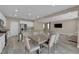 Open floor plan with kitchen, dining area, and living room at 9947 Tucket Point Ct, Las Vegas, NV 89178