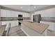 Modern kitchen with stainless steel appliances and white cabinets at 9947 Tucket Point Ct, Las Vegas, NV 89178