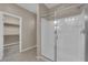Modern walk in shower with glass enclosure and tile surround at 9947 Tucket Point Ct, Las Vegas, NV 89178