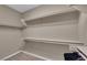 Walk-in closet with shelving and clothing racks at 9947 Tucket Point Ct, Las Vegas, NV 89178