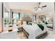 A well-lit bedroom offering a bed, and mirrored closet at 2093 Seahurst Dr, Las Vegas, NV 89142
