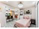 ' bedroom next to open living room featuring a bed, closet and plush toys at 2093 Seahurst Dr, Las Vegas, NV 89142