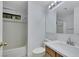 Bright bathroom featuring a tub and shower combo with updated vanity and hardware at 2627 S Durango Dr # 201, Las Vegas, NV 89117