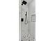 Modern shower with black fixtures, designer tile, and a built-in shelf at 3326 Mount Charleston Dr, Pahrump, NV 89048
