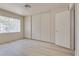 This bedroom has a large closet and a large window at 4630 Pratt Way, Las Vegas, NV 89147