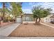 Charming single-story home featuring a well-maintained front yard and attached garage, enhancing curb appeal at 4630 Pratt Way, Las Vegas, NV 89147