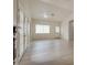 Spacious living room with new floors, high ceilings, fireplace, and natural light, perfect for entertaining at 4630 Pratt Way, Las Vegas, NV 89147