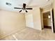 Bedroom featuring neutral walls, carpet flooring, closet and entry to the adjacent room at 5517 Overlook Valley St, North Las Vegas, NV 89081