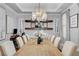 Sophisticated dining room featuring a modern chandelier and decor for elegant entertaining at 5716 Breckenridge St, North Las Vegas, NV 89081