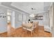 Elegant dining room with a chandelier, space for ten, and modern décor at 5716 Breckenridge St, North Las Vegas, NV 89081