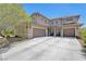 Charming two-story home featuring a spacious driveway and attached two-car garage at 5716 Breckenridge St, North Las Vegas, NV 89081