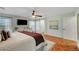 Bright main bedroom with a ceiling fan, and natural light at 5716 Breckenridge St, North Las Vegas, NV 89081