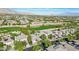 Beautiful aerial view of a well-planned community with houses near a lush green golf course at 613 Pinnacle Heights Ln, Las Vegas, NV 89144