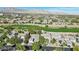 Scenic view of a neighborhood adjacent to a golf course, complete with city skyline at 613 Pinnacle Heights Ln, Las Vegas, NV 89144