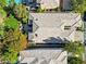 Overhead view of the house showing the roof and neighboring properties; has a nice backyard with trees at 613 Pinnacle Heights Ln, Las Vegas, NV 89144
