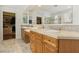Bathroom with tile flooring, double sinks, and granite countertops at 613 Pinnacle Heights Ln, Las Vegas, NV 89144