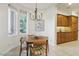 Bright breakfast nook area with adjacent access to the kitchen and outdoor views at 613 Pinnacle Heights Ln, Las Vegas, NV 89144