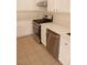 Bright kitchen with white cabinets, stainless steel appliances, and white quartz countertops at 6449 Elizabethtown Ave, Las Vegas, NV 89110