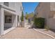 Well maintained backyard with stone ground cover and a walkway at 6601 W Pepperidge Way, Las Vegas, NV 89108