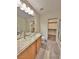Bathroom featuring a glass vessel sink, walk-in closet, and a walk-in shower at 6621 Churnet Valley Ave, Las Vegas, NV 89139