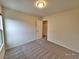 Neutral bedroom featuring carpeted floors, a window letting in natural light, and a closet at 6621 Churnet Valley Ave, Las Vegas, NV 89139
