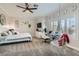 Stylized bedroom featuring unique moon decor, pendant chair, and bright natural light at 7404 Wittig Ave, Las Vegas, NV 89131