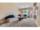 Bright and airy living room with vaulted ceilings and a comfortable seating area at 7404 Wittig Ave, Las Vegas, NV 89131