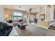 Comfortable living room with a large window, neutral tones, and stylish decor at 7404 Wittig Ave, Las Vegas, NV 89131