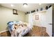 Well-lit bedroom boasts hardwood floors and two closets, with multiple doors for entry and closet use at 10042 Pipestone St, Las Vegas, NV 89141