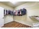 Walk-in closet with ample hanging space and shelving for organization at 10042 Pipestone St, Las Vegas, NV 89141