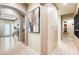 Hallway with tiled floor showcases natural light with decorative touches throughout at 10042 Pipestone St, Las Vegas, NV 89141