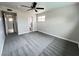 Cozy bedroom with plush carpet, ceiling fan, and bright natural light at 1338 Smoke Tree Ave, Las Vegas, NV 89108