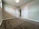 Bedroom featuring carpet, neutral walls, and view into the connected bathroom at 1338 Smoke Tree Ave, Las Vegas, NV 89108