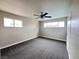 Comfortable bedroom featuring soft carpet, windows, and ample natural light at 1338 Smoke Tree Ave, Las Vegas, NV 89108