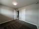 Bedroom featuring neutral walls, carpet, and view into the connected bathroom at 1338 Smoke Tree Ave, Las Vegas, NV 89108